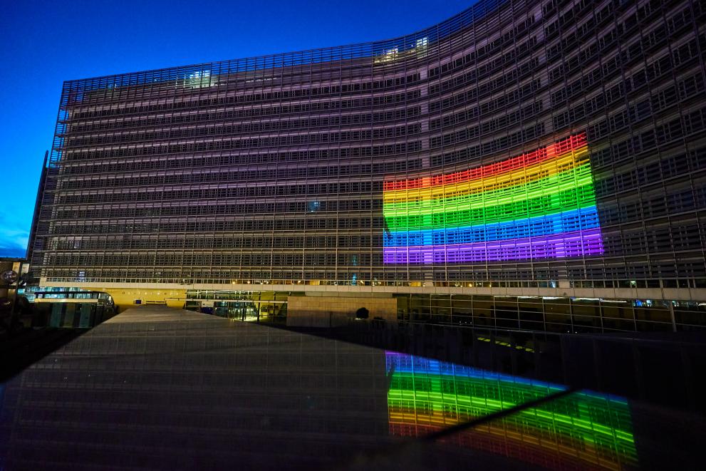 Berlaymont building lit with the rainbow flag colours to mark IDAHOT 2022