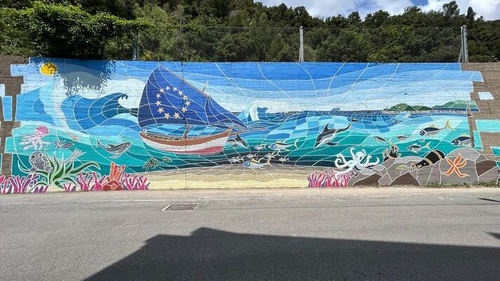 murales con barca e vela bandiera ue